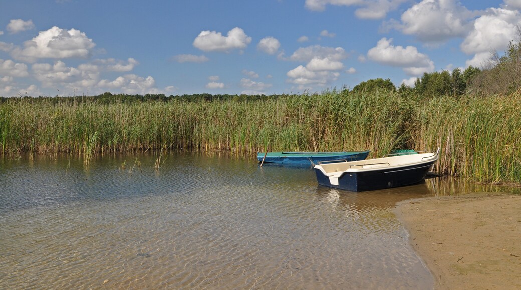 Old fishing boats on a lake shore, Boszkowo, Poland; Shutterstock ID 152304869