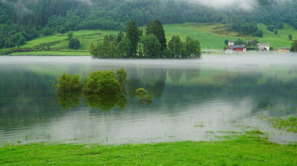 Just a little east of Vossevangen on the road to Bergen. The timing was just right to see this beautiful scene.