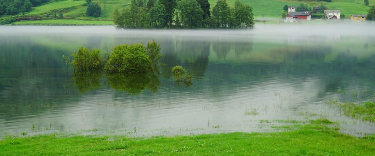 Just a little east of Vossevangen on the road to Bergen. The timing was just right to see this beautiful scene.