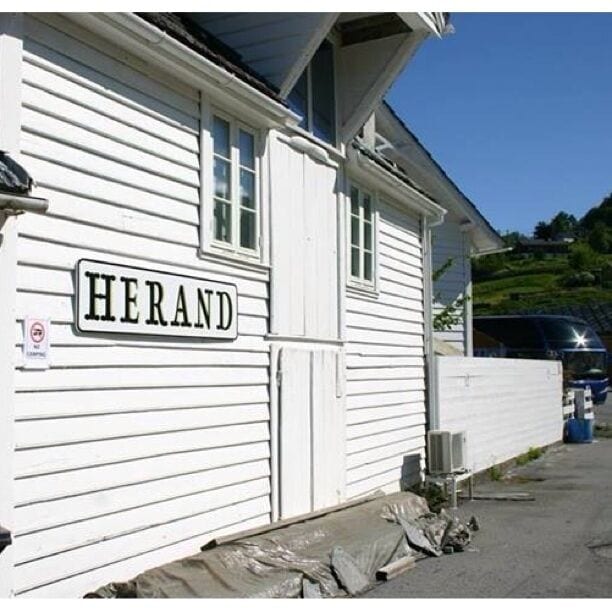 One of the wooden houses by the small harbour.
