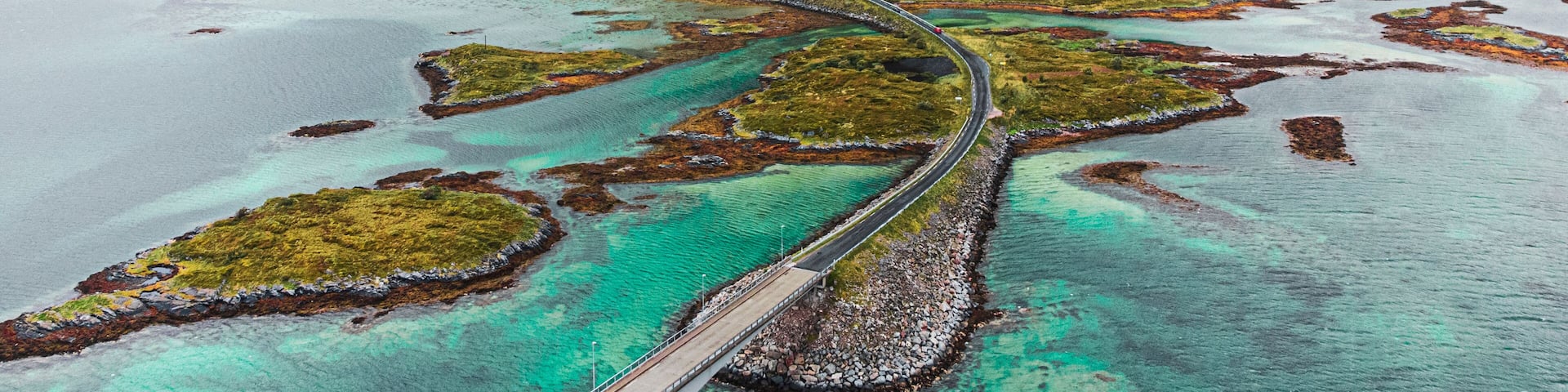 the Volandstinden mountain on the Lofoten islands and the Road to Fredvang
