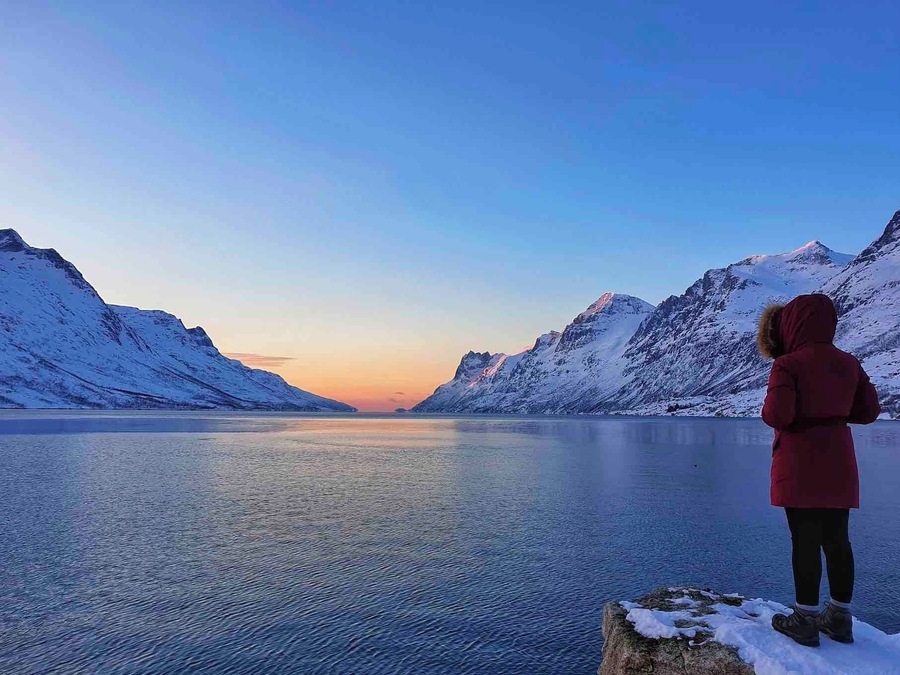 Looking over Ersfjorden about an hour before sunset. Even though the skies were clear it was still a beautiful place to take a photo #travel #norway #ersfjorden #arctic #roadtrip #fjord