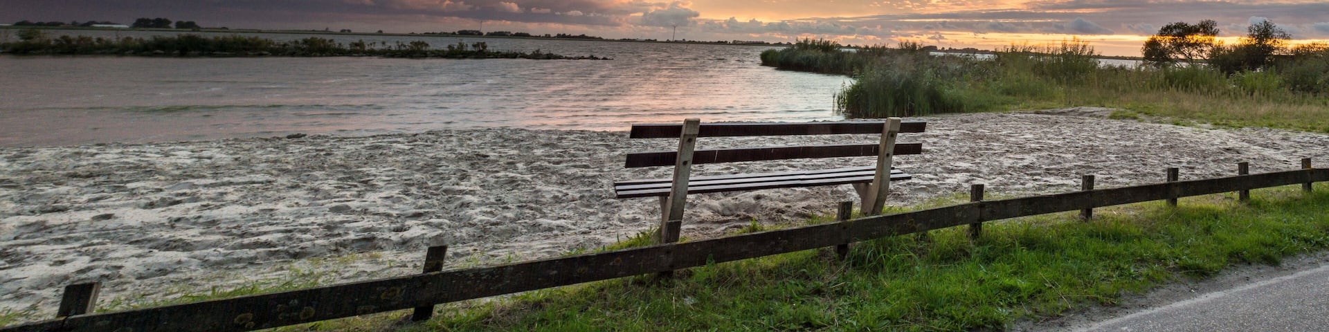 Lonely bank and sunset