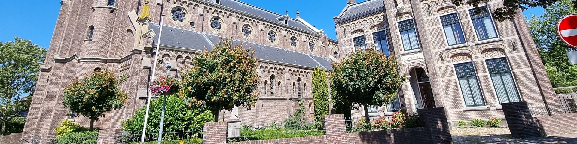The Neo-Romanesque Catholic Ursula Church and historic building in Warmenhuizen, North Holland, Holland, The Netherlands