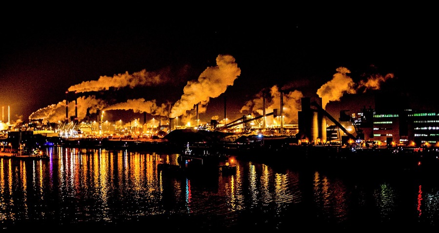 Industrial skyline of the steelwork's at night viewed from a passing cruise ship.