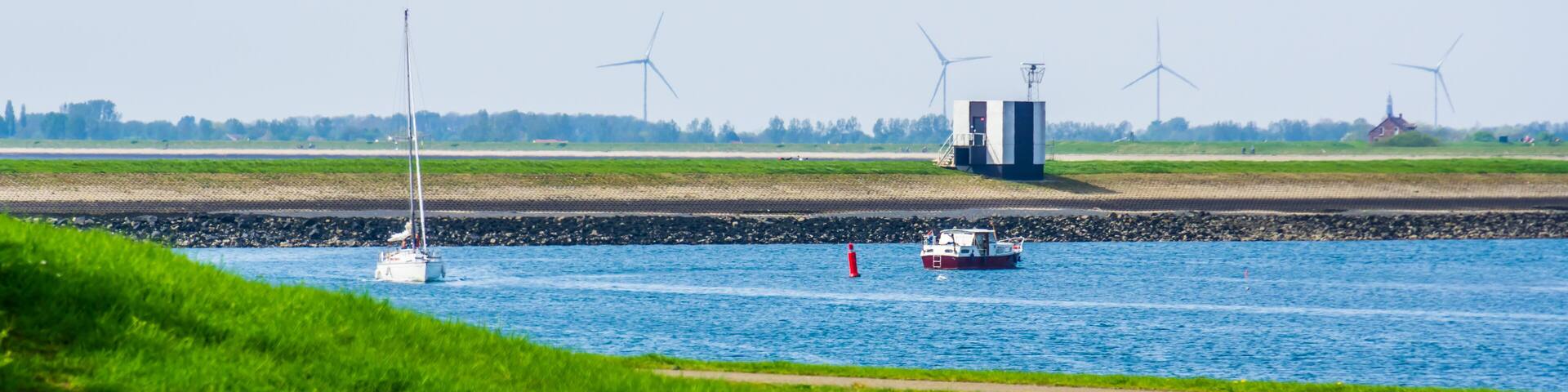 ships sailing in the harbor of Tholen, Bergse diepsluis, Oosterschelde, zeeland, The netherlands