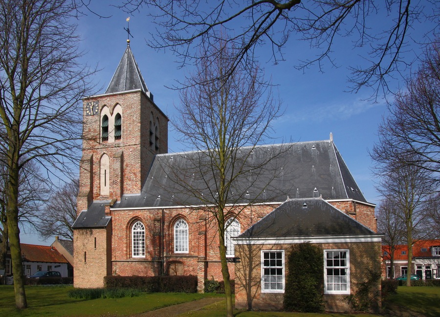 The church of Biggekerke village with its gothic brick tower in Veere, Zeeland, the Netherlands