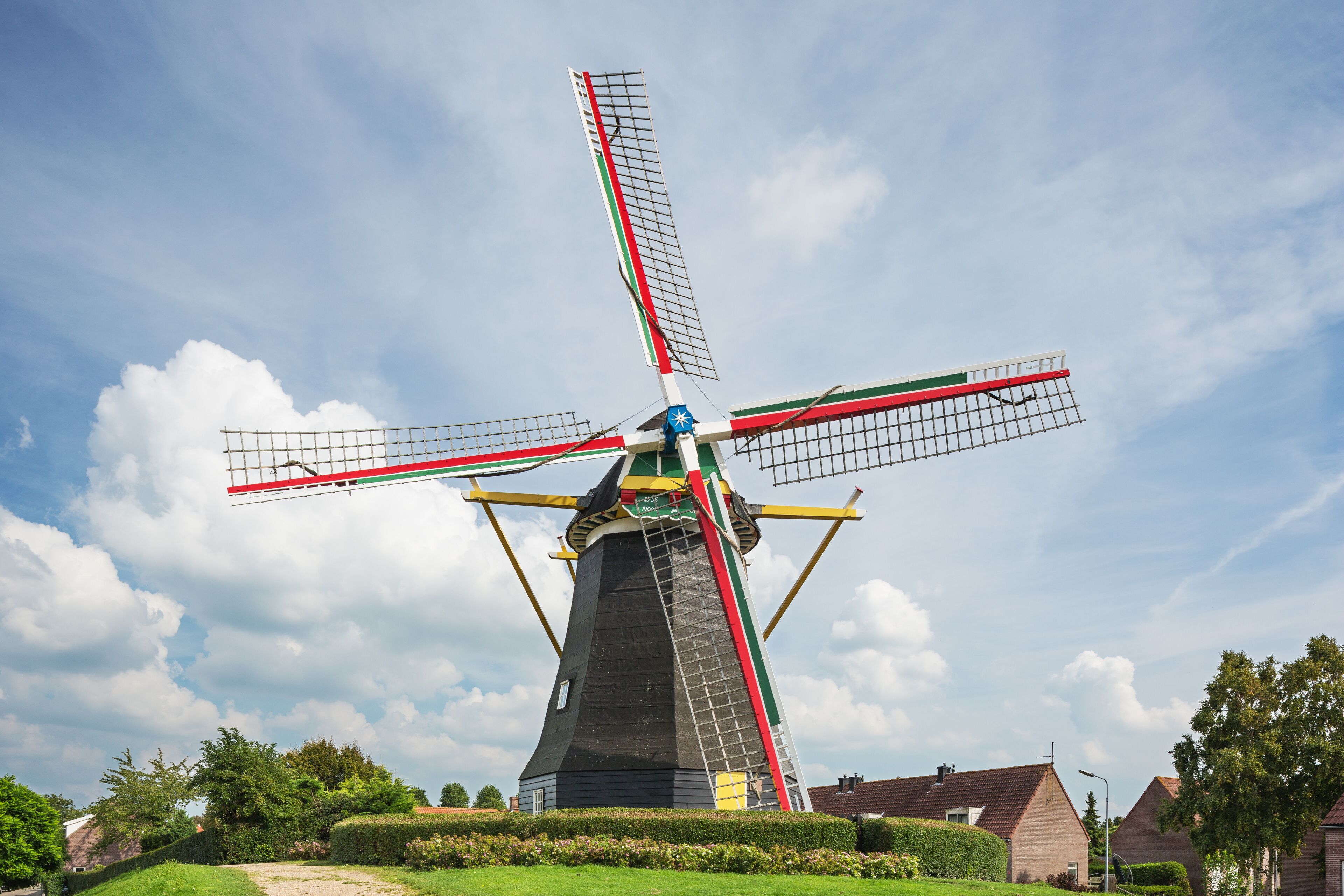 Colorful windmill Nooitgedacht in the middle of Arnemuiden
