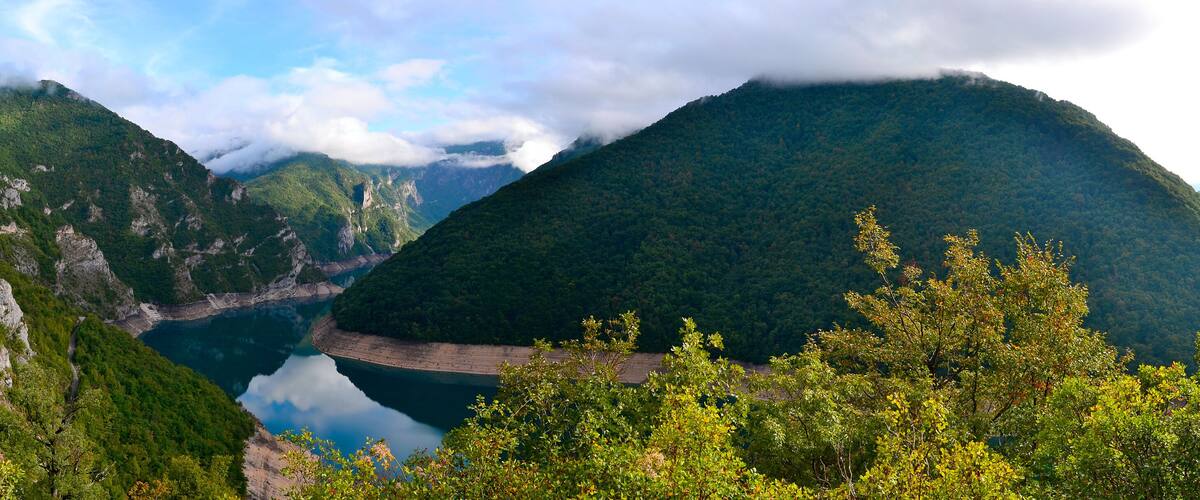 Panoramic view at Piva Lake(Pivsko Jezero) near Pluzine, Montenegro.