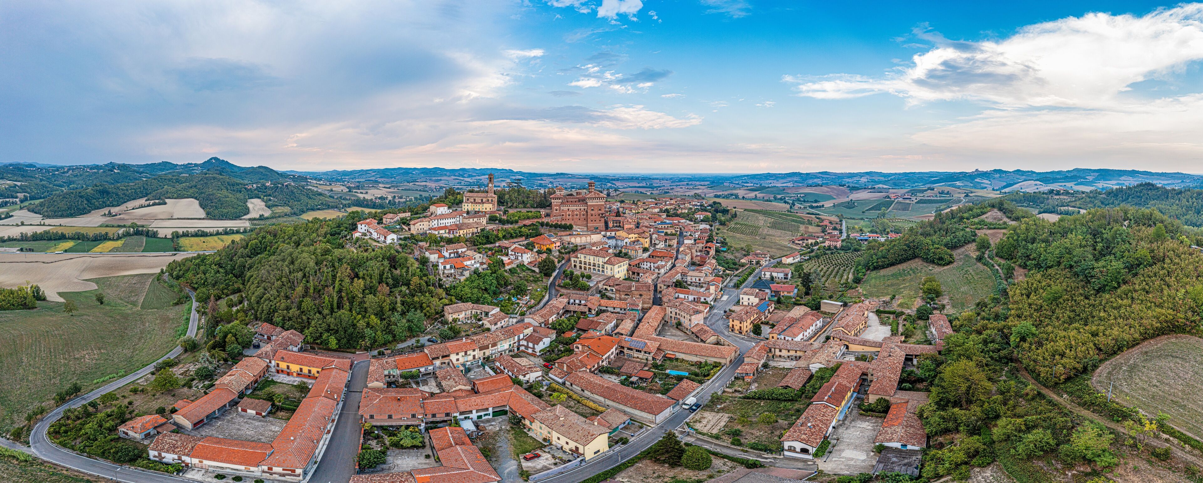 Panoramic drone picture of Castello Cereseto in Piedmont in the evening