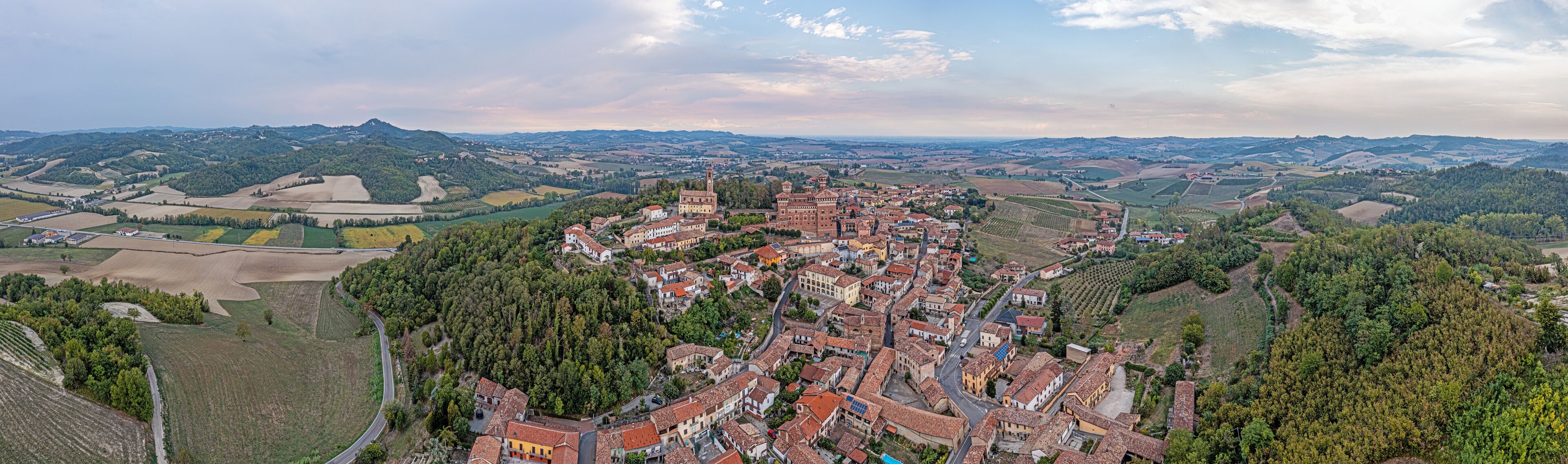 Panoramic drone picture of Castello Cereseto in Piedmont in the evening