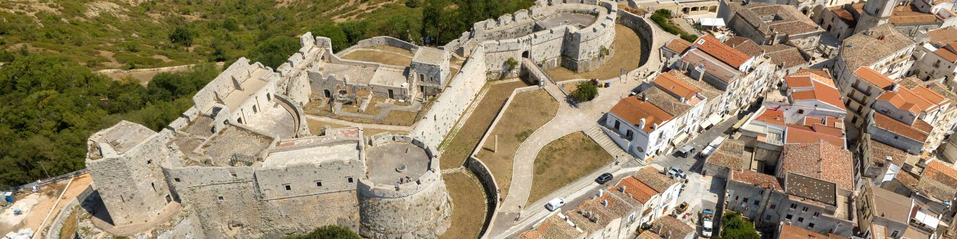 Aerial view of the Monte Sant'Angelo Castle. It is an ancient fortress located in the historic center of Monte Sant'Angelo, in the province of Foggia, Puglia, Italy.