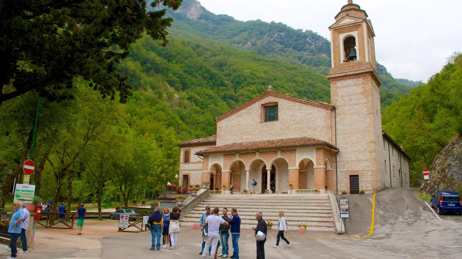 Italy featuring a church or cathedral, heritage architecture and a small town or village