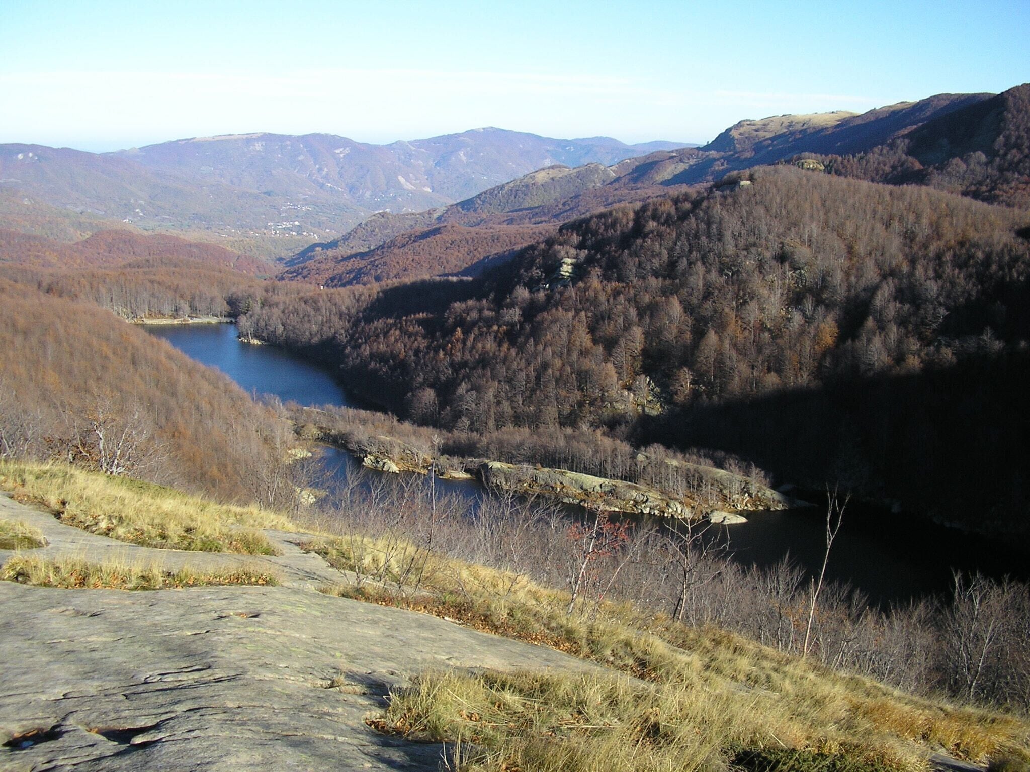 500px provided description: Northern Apennines (Italy), Nov 2007 [#sky ,#landscape ,#lake ,#water ,#nature ,#river ,#travel ,#rock ,#wood ,#mountain ,#valley ,#hill ,#outdoors ,#scenic ,#no person]