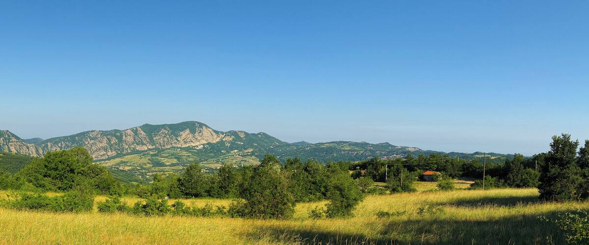 A mountainous landscape with a clear sky.