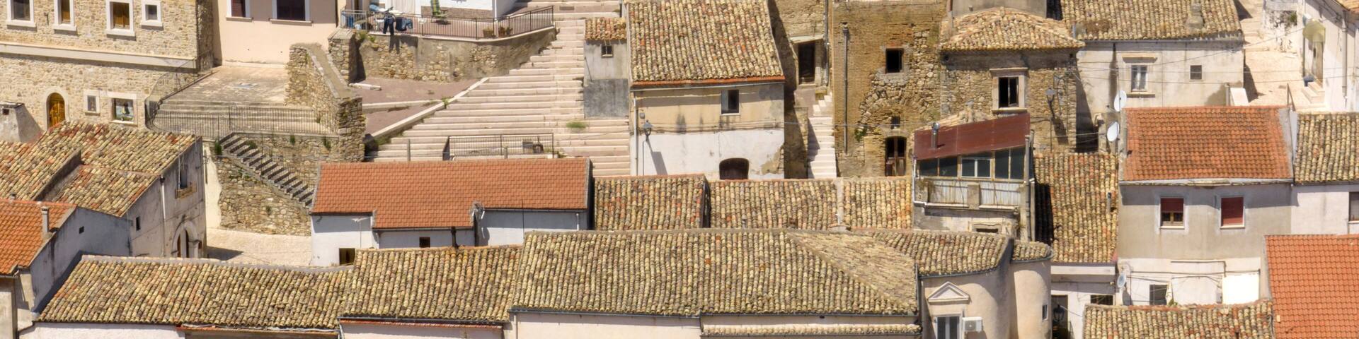 Aerial view of buildings and houses in the town of Candela, located on a hill in the province of Foggia, Puglia, Italy.