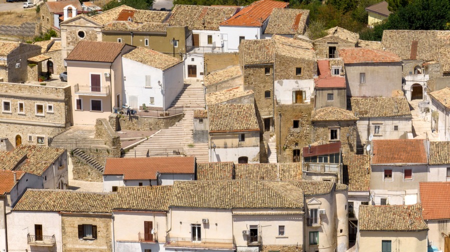 Aerial view of buildings and houses in the town of Candela, located on a hill in the province of Foggia, Puglia, Italy.