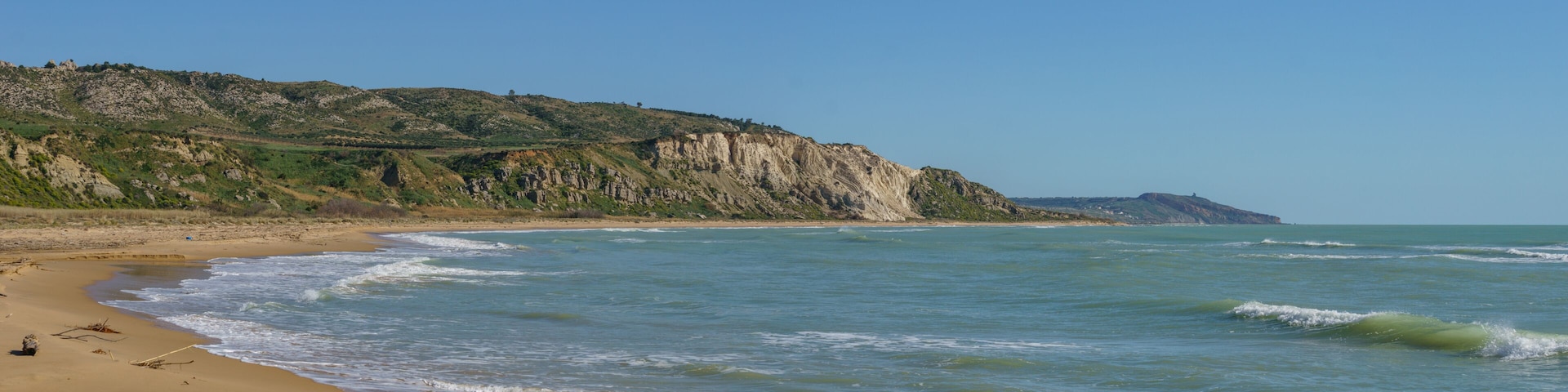 Panoramic view of beach at nature reserve of Torre Salsa on a sunny day, Sicily, Italy
