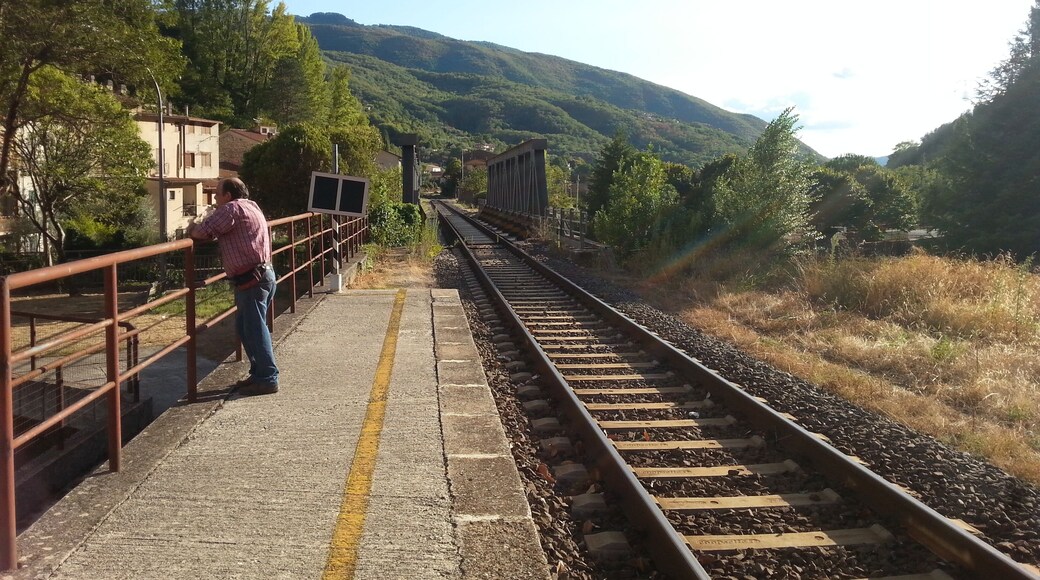 Antrodoco Centro railway stop (province of Rieti, central Italy), on the Terni-Rieti-L'Aquila-Sulmona line. View of the tracks heading to Terni with the iron bridge over Velino river.