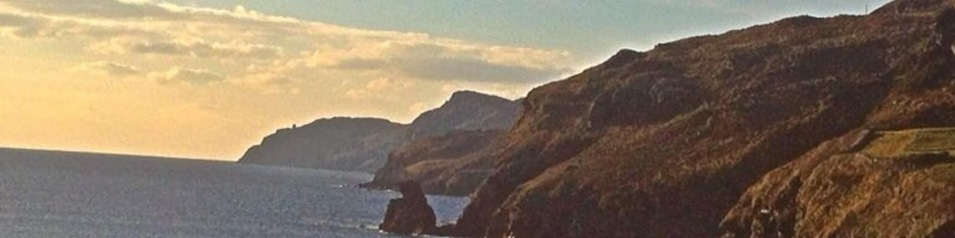 A view along a scenic Rd. West Donegal. With a old hand built stone wall along the edge of the cliff