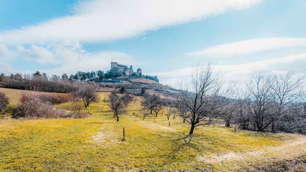 Watchtower of Boldogkő or Boldogko fortress with Boldogkővárallja village near tokaj region in Hungary