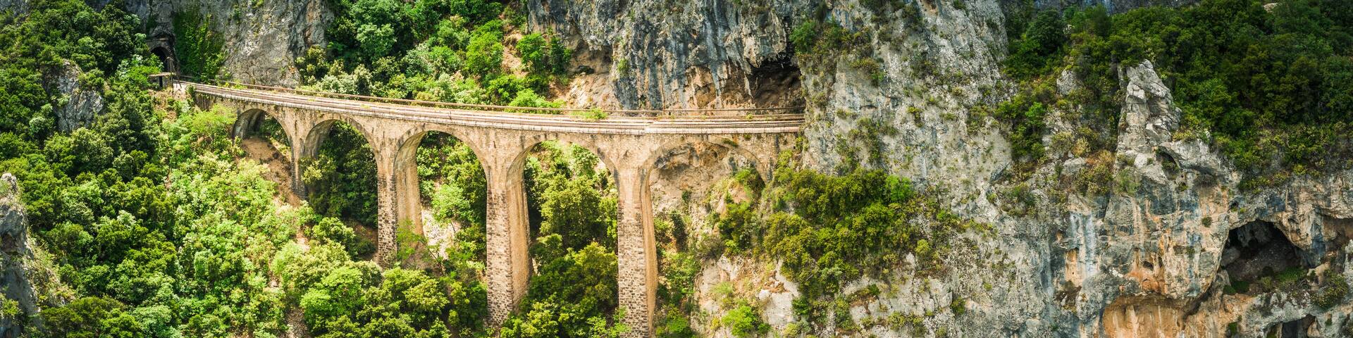 The old railway bridge of the Asopos river near village Iraklia at national park of Oiti, Greece
