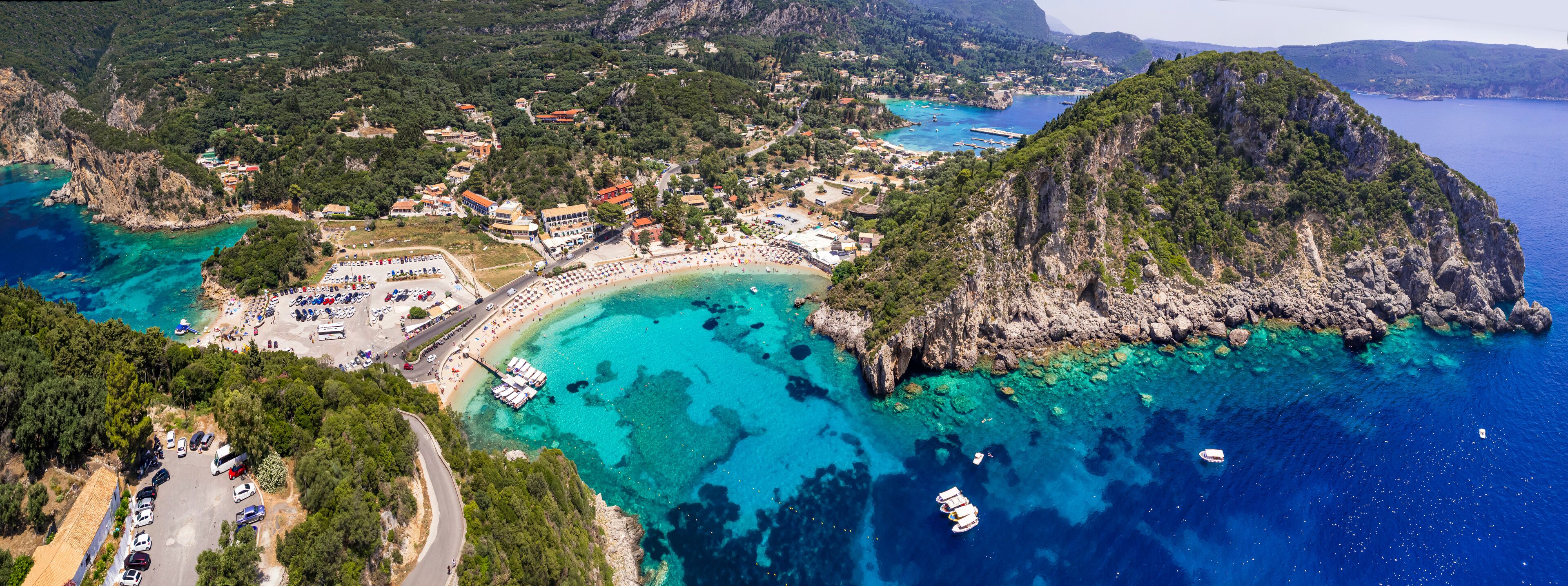 Greece. Corfu island best beaches. Stunning Paleokastritsa bay with turquoise sea. Aerial drone view of Agios Spiridon beach
