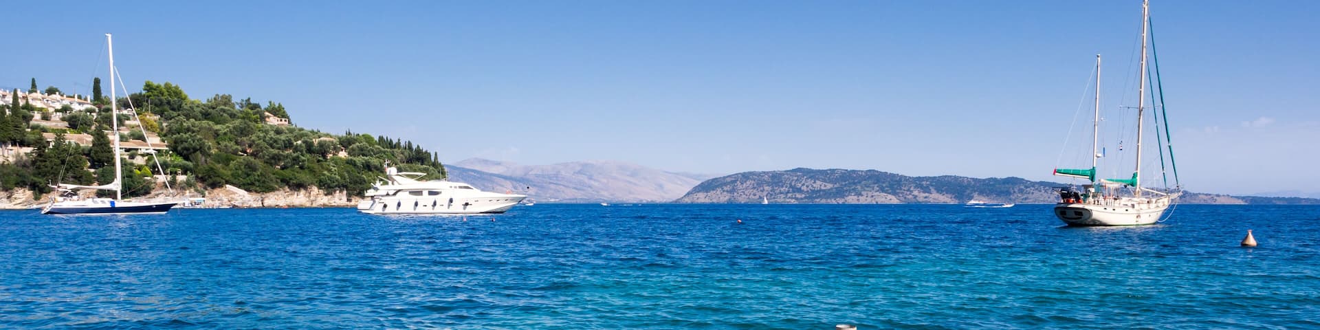 Pier in Kalami village on Corfu island, Greece, Shutterstock ID 534328804, Purchase Order: SP-1394 HA Batch 3 Part 1, Order Number: , Client/Licensee: HomeAway, Other: To be paid with HA budget