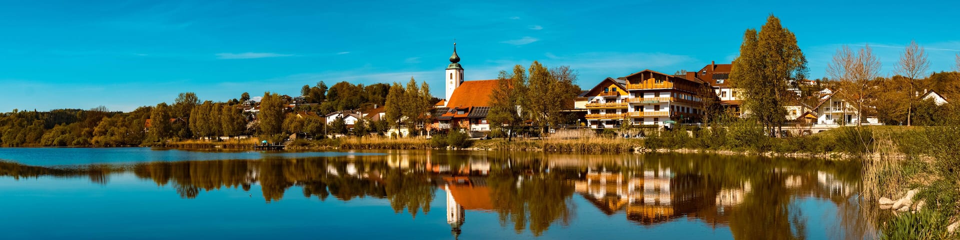 High resolution stitched panorama of a beautiful spring view with reflections at Windorf, Danube, Bavaria, Germany