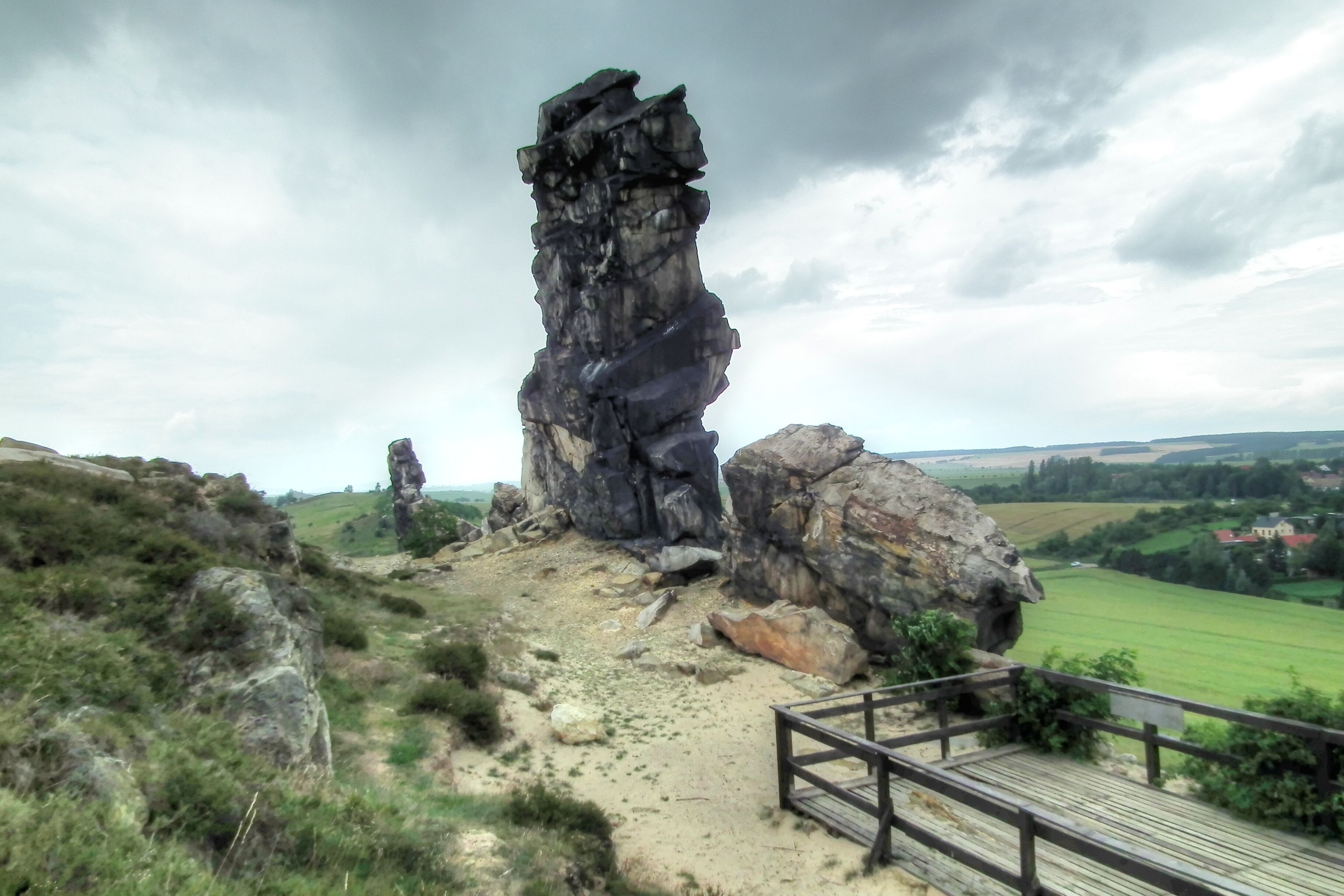A rocky outcrop with a wooden viewing platform.