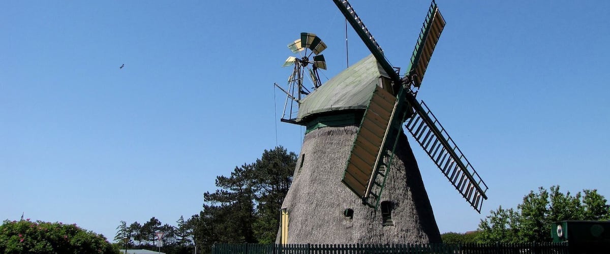 Germany / North Sea / Island Amrum: wind mill in Nebel
