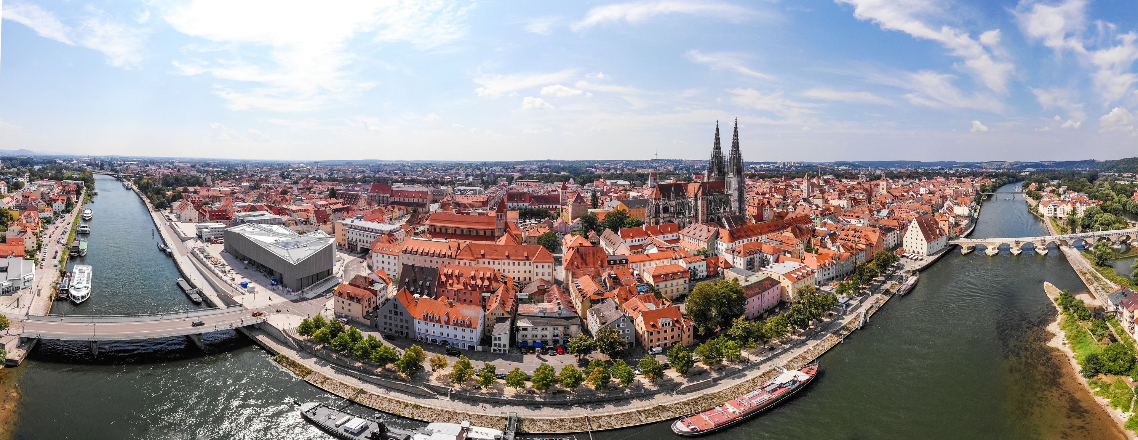 Panoramic landscape with view on Danube river and Regensburg city architecture, Germany, Aerial photography