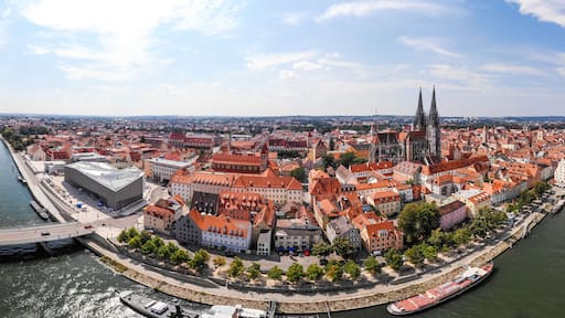 Panoramic landscape with view on Danube river and Regensburg city architecture, Germany, Aerial photography