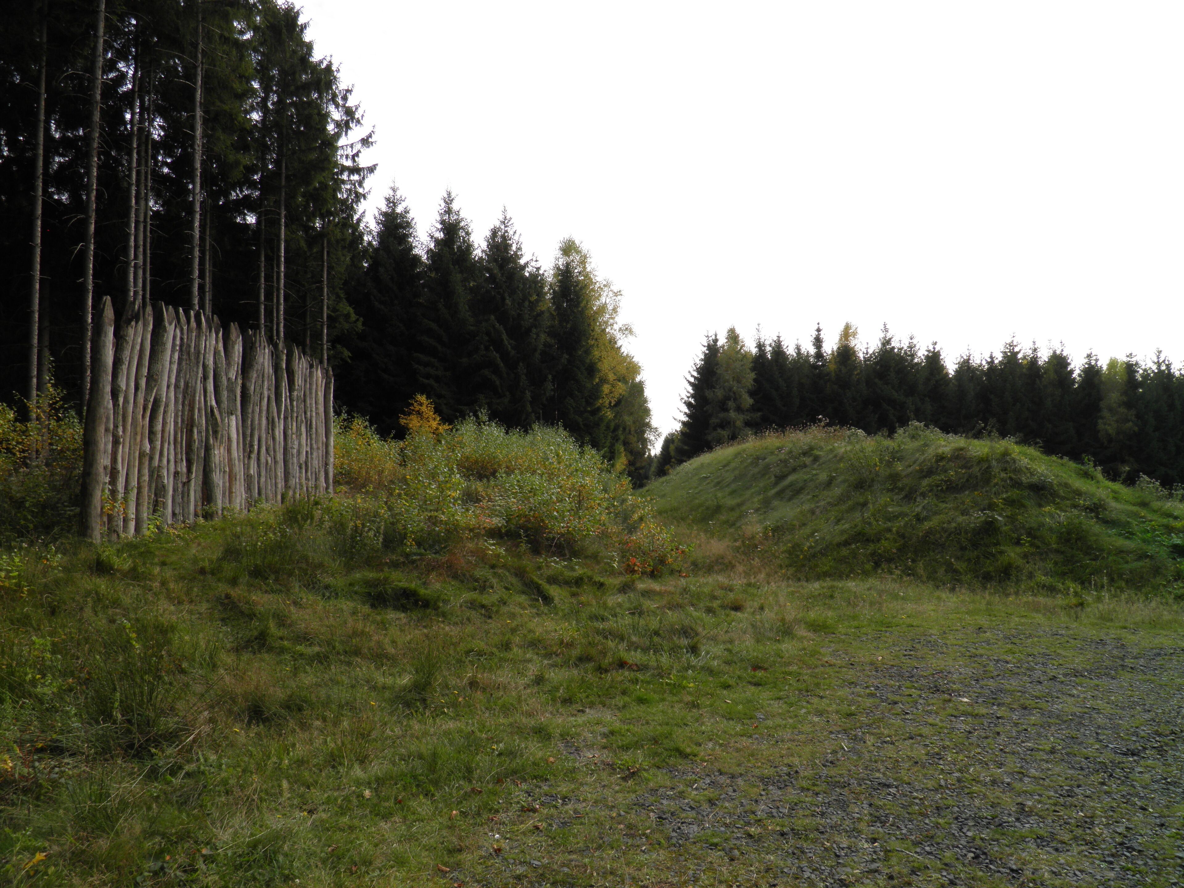 Bank and ditch of the limes with a reconstructed palisade at Hillscheid