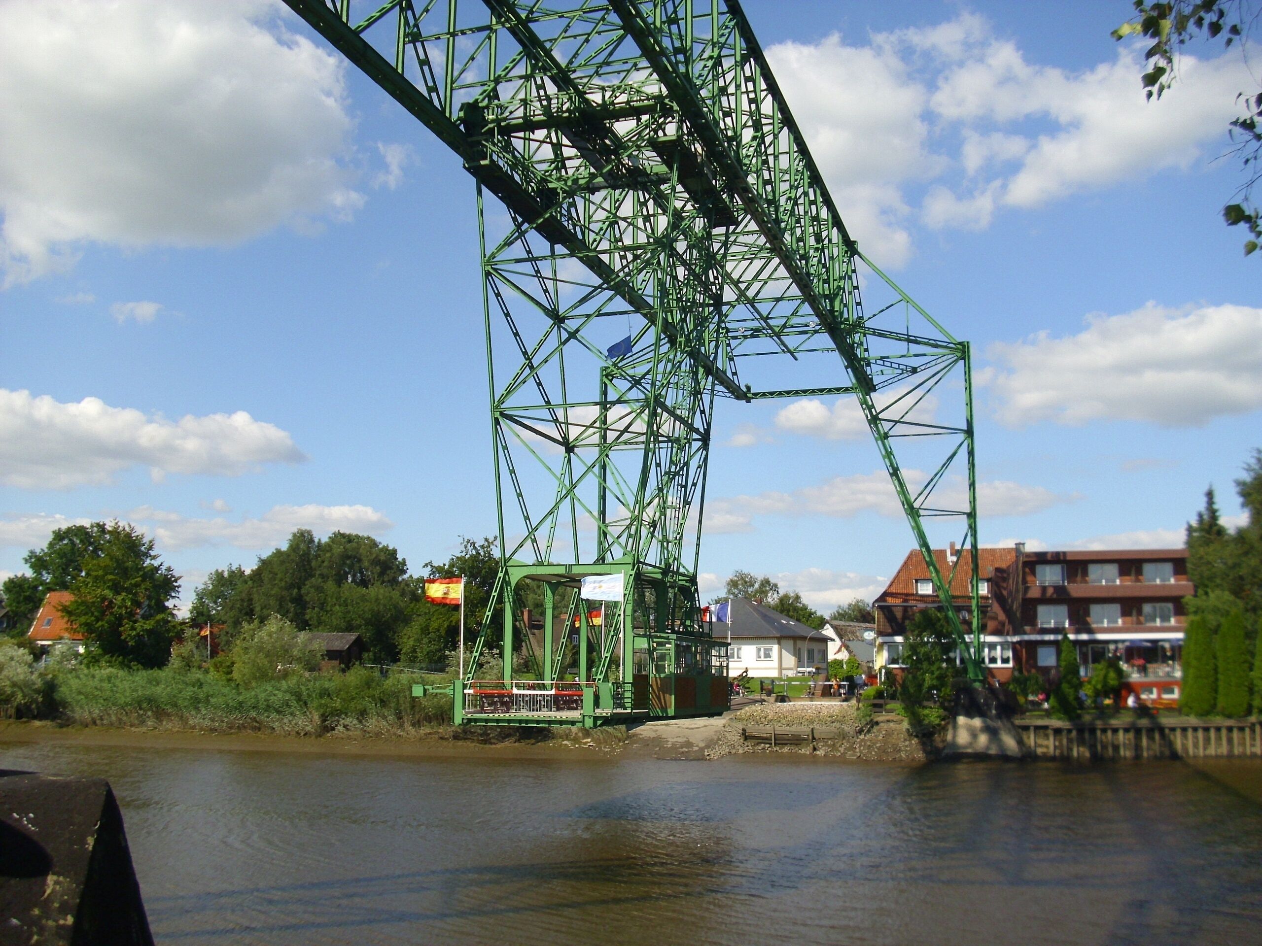 View of the transporter bridge in Osten over the Oste river, district of Cuxhaven, Lower Saxony, Germany