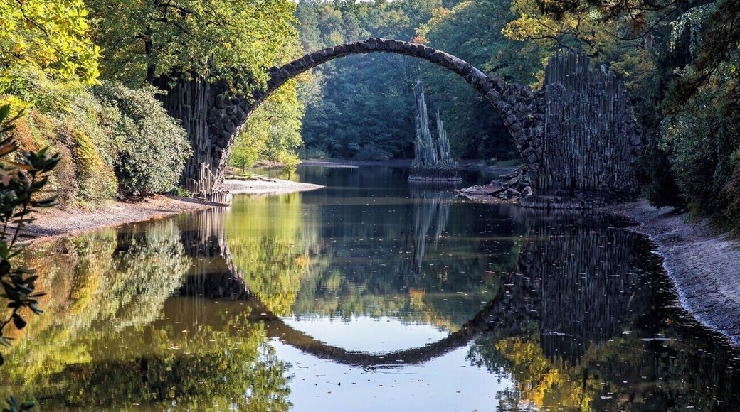 Rakotzbrucke, also called the Devil's Bridge, looks like something that belongs in a fairytale. It is located in Saxony, Germany. Getting here can be a bit of a challenge, since it is not really located near any major city, but we visited this bridge on a day trip from Berlin.
Learn how to visit Rakotzbrucke: http://www.earthtrekkers.com/rakotzbrucke-fairytale-bridge-saxony-germany/