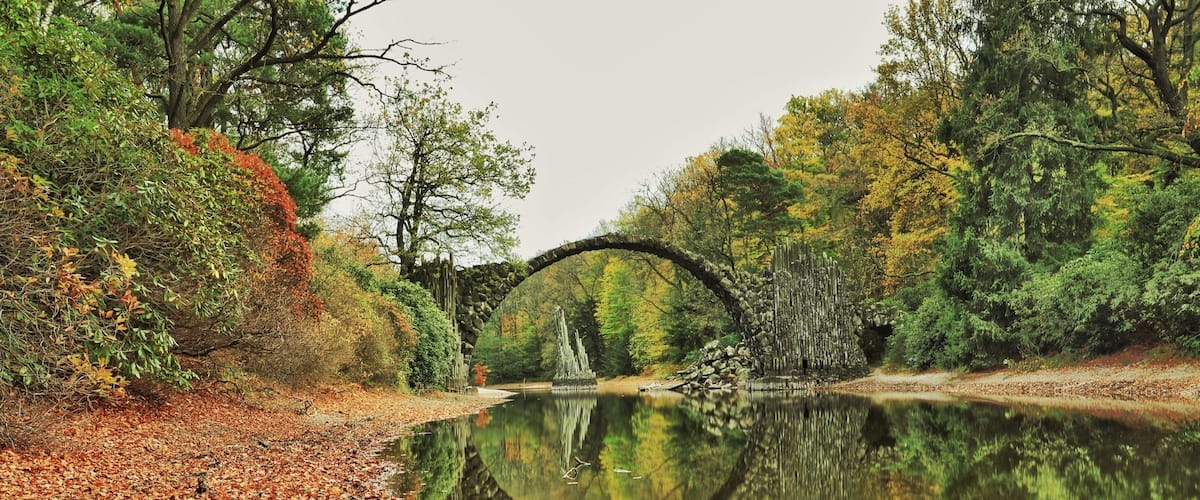 Travelling has taken me to many places but this trip I wanted to find the "Devils Bridge". A couple of hours from Berlin near the Polish border you can find Kromlau Park. Here is Ratozbrucke. An engineering feat from 1860 where the bridge makes a complete circle in reflection. Many myths surrounding this and other bridges like it around the world. Enjoy if you get here. #nature #bridges #traveltheworld #history #parks