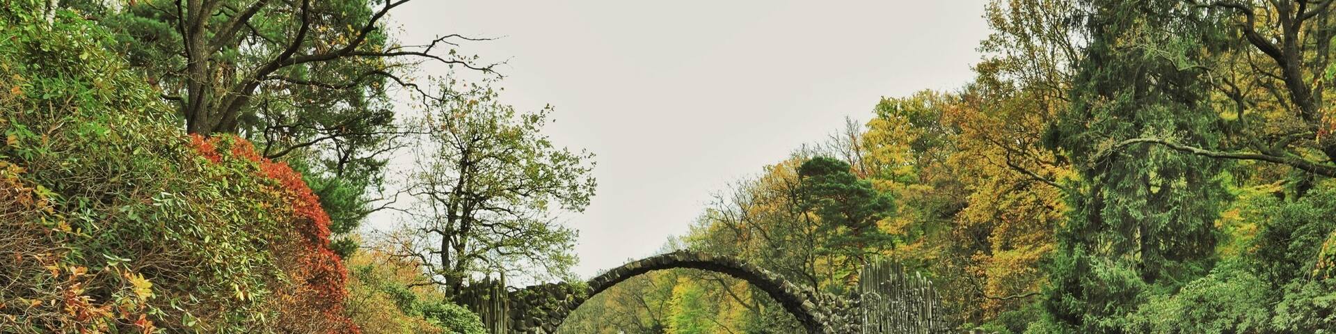 Travelling has taken me to many places but this trip I wanted to find the "Devils Bridge". A couple of hours from Berlin near the Polish border you can find Kromlau Park. Here is Ratozbrucke. An engineering feat from 1860 where the bridge makes a complete circle in reflection. Many myths surrounding this and other bridges like it around the world. Enjoy if you get here. #nature #bridges #traveltheworld #history #parks