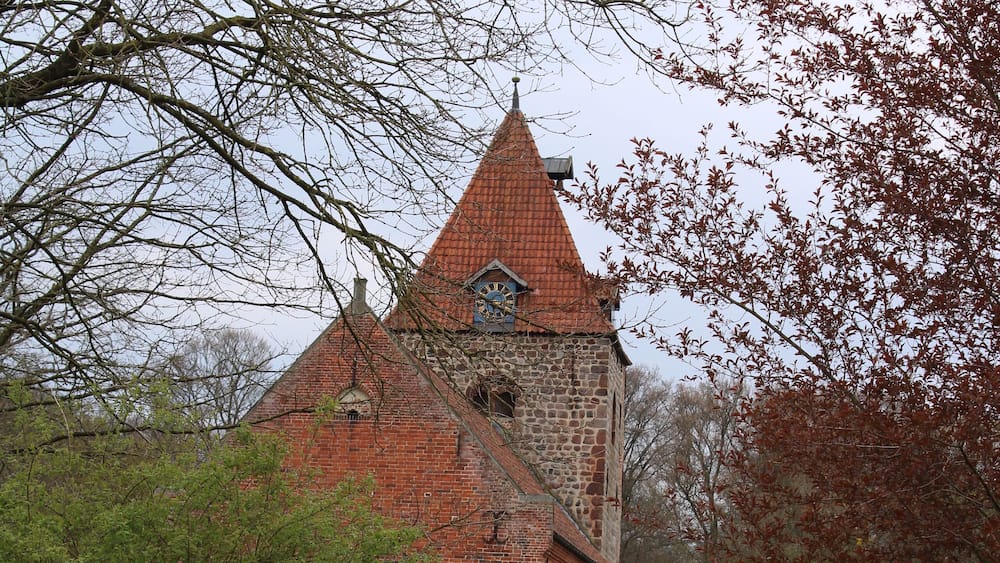 Hiking on the Huntepadd in northwestern Germany, St. Firminus church in Dötlingen