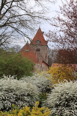 Hiking on the Huntepadd in northwestern Germany, St. Firminus church in Dötlingen