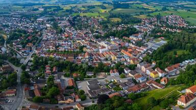 Aerial panoramic view of the city and old town of Dorfen, Bavaria in Germany on a sunny day in summer.