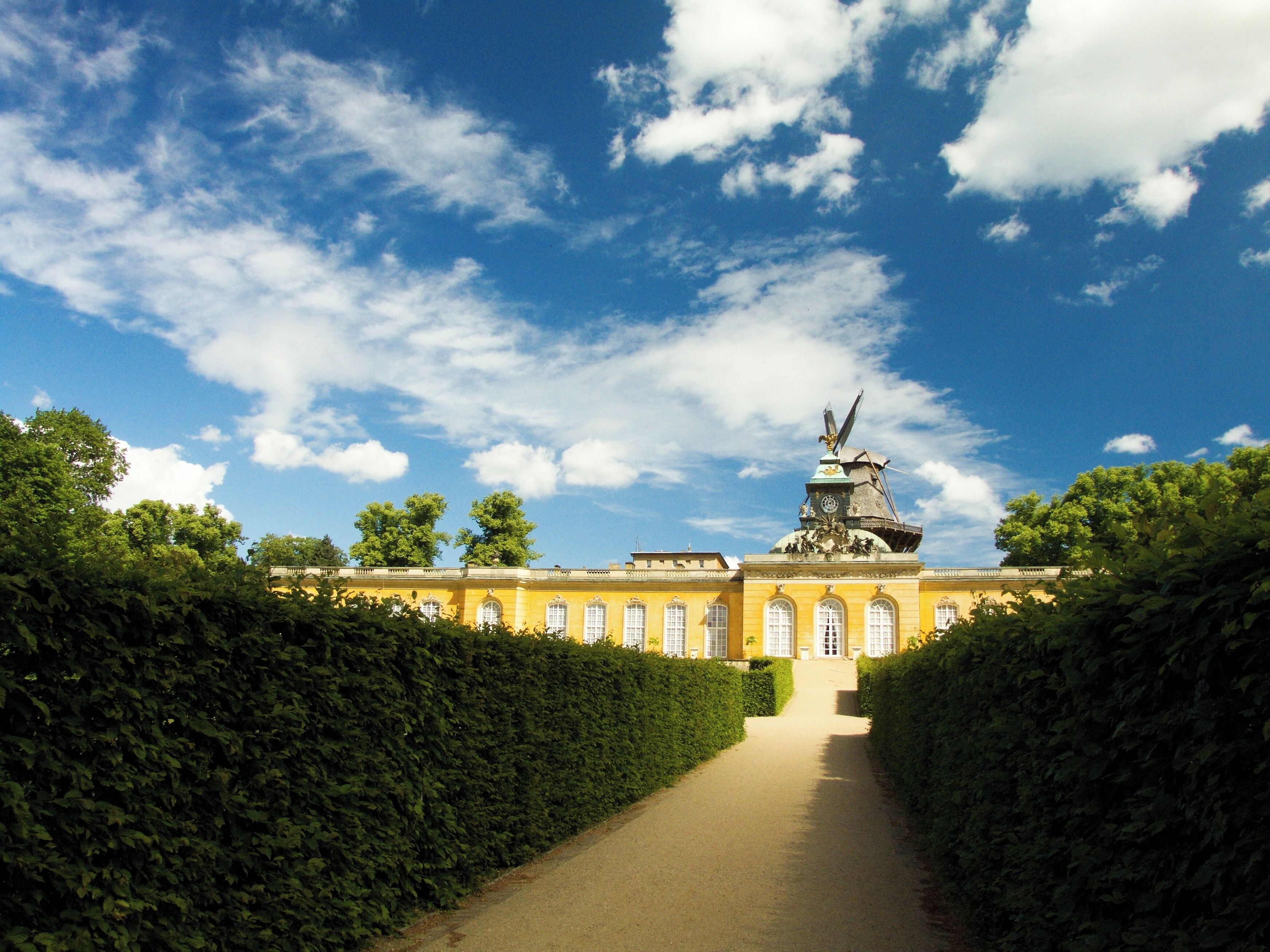 Potsdam, Germany; New Chambers in Sanssouci Park with Historic Windmill in background