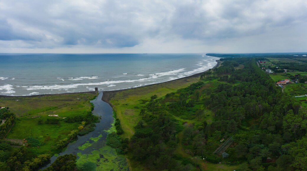healing black sand beach in georgia. Magnetic sand on the beach in Magnetiti Batumi. High waves in the black Georgian sea in the village of Ureki
