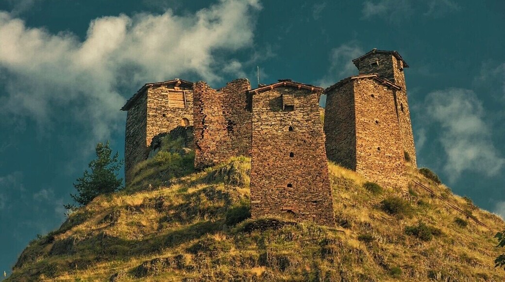 July 2010
Keselo Fortress, Kvemo Omalo, Tusheti
The top towers of Keselo, a medieval fortress consisting of 13 towers built in 14-15th century, altitude is ca. 2.000 metres. The fortress originally served as protection against Mongol invaders and later against Dagestani invaders. It was mostly used only in summer months when the raids were usual. In winter people lived in the village below the fortress. It has lost its purpose in 19th century after the Russians allied with local Tushs. It was abandoned and destroyed during World War II. In 2003 the reconstruction started and sponsored by a Dutch family. Many of the towers were built back from ruins, accomodating a museum of local tradition with many old photos from the region. Keselo is few tens of metres over the village Kvemo (=Upper) Omalo, which is a usual starting point for trek west to Shatili in Khevsureti region or day hikes to Shenako or Diklo villages to the east.