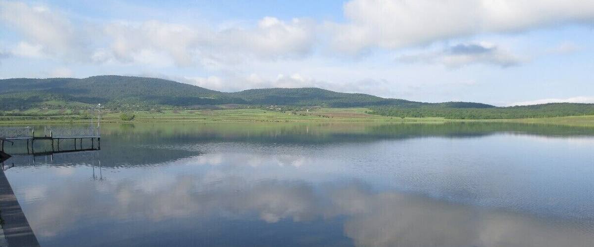 #Bazaleti View from a lake in the country of Georgia. This is the calm surface of a lake called Bazaleti.