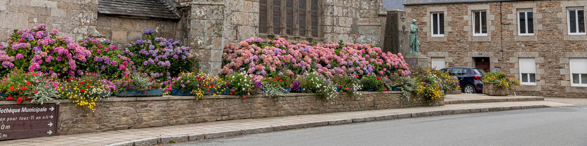 Ploumilliau (Plouilio), France. The Eglise Saint-Milliau (St Miliau Church), a Roman Catholic Gothic temple in this small town of Brittany