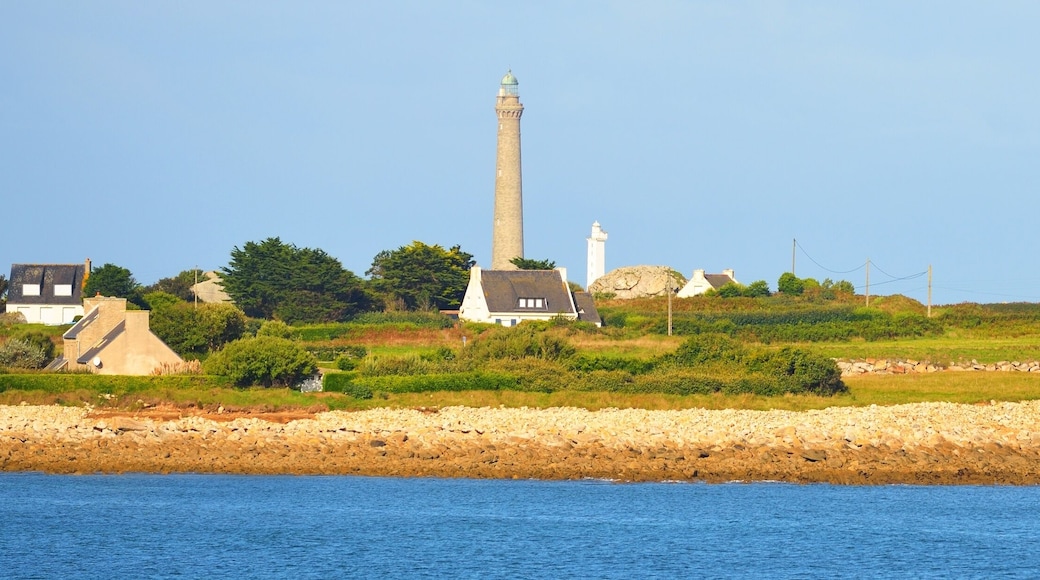 Panoramic view of the Île Vierge lighthouse against clear blue sky. Brittany, France. Architecture, travel destinations, tourism, vacations, national landmark, sightseeing