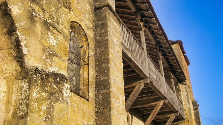 Medieval wooden balcony in a street in Plazac,Dordogne, France