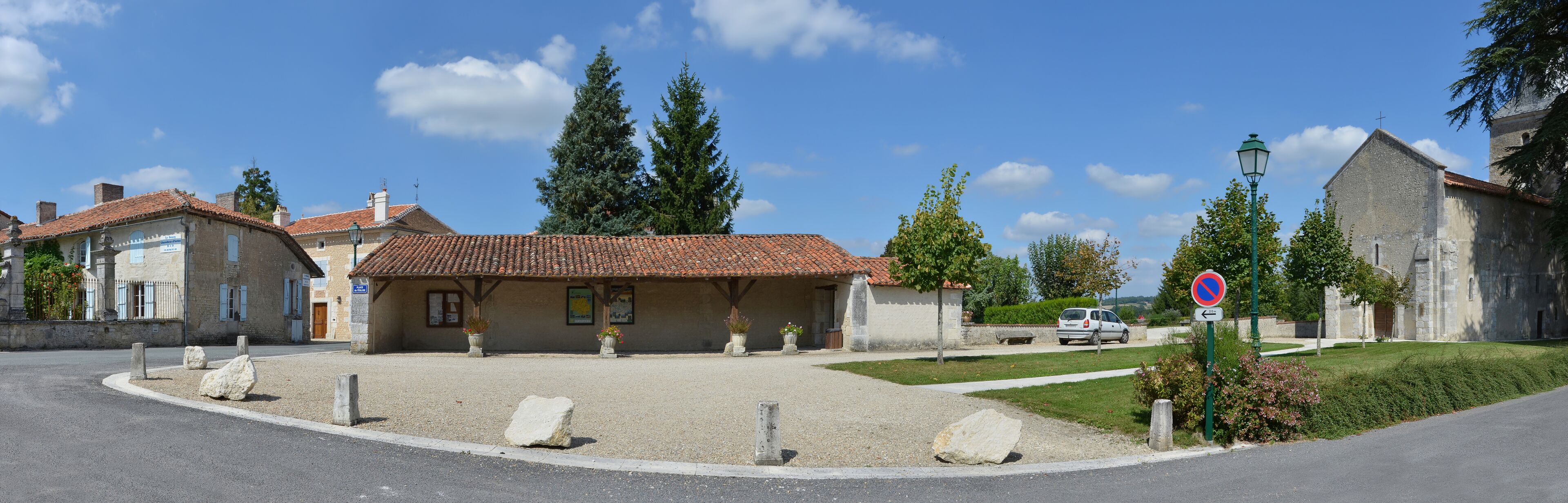 Place of the church and former village market hall, Nonac, Charente, France.