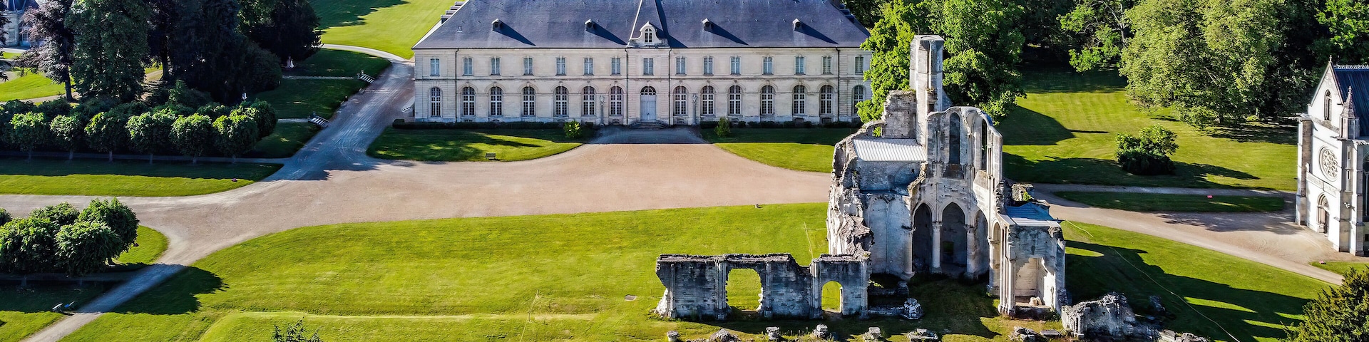 Aerial view of the ruins of the Royal Abbey of Chaalis and of the castle of Jean Aubert near Ermenonville in the French department of Oise in Picardy, North of France